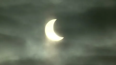 Solar eclipse, the moon obscured the sun, running clouds Stock-Footage 10825435