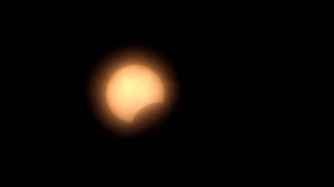 Solar eclipse occurs over the Midtown Manhattan skyscrape in New York City Video stock 277864091