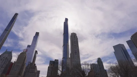Solar eclipse occurs over the Midtown Manhattan skyscrape in New York City Stock Footage 277876123