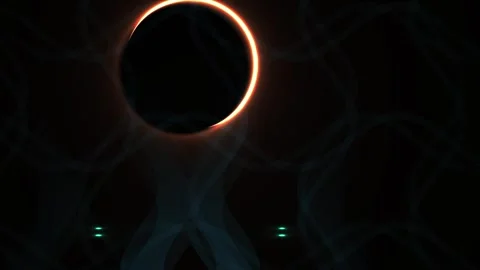 Solar eclipse with orange glow on dark background. Stock Footage 336256795