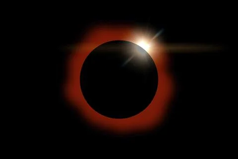 Solar eclipse with orange halo on black sky background Stock Photos