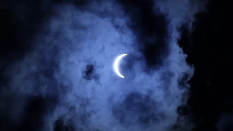 Solar Eclipse Partial Clouds 03 Stock Footage