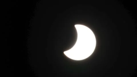 Solar eclipse. Partial solar eclipse in Moscow 25.10.2022 timelapse Stock-Footage 220482762