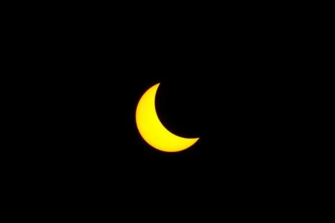 Solar eclipse prior to totality, 2017. Ilustração Stock