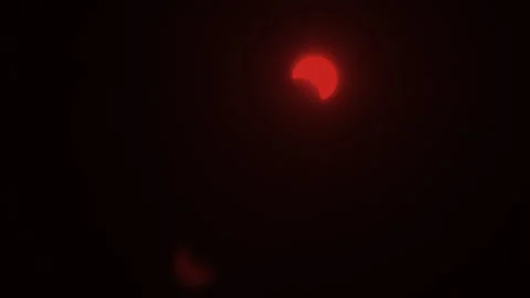 Solar Eclipse with Red Filter Last Phase with Red Filter Astrophotography Stock Footage 343075178