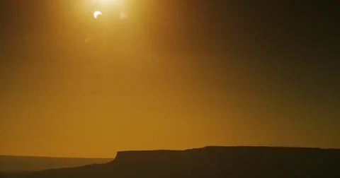Solar eclipse, “Ring of Fire” event of 2012, over a classic desert landscape Stock Photos