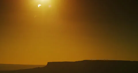Solar eclipse, “Ring of Fire," over classic desert mesa landscape. Stock Footage 285813852