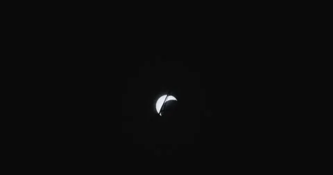 A solar eclipse seen from Little Rock, Arkansas, USA in a dark night sky Stock Footage 276838000