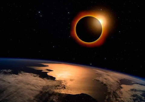 Solar Eclipse on Starry Sky Solar eclipse with orange halo over the planet... Fotos Stock