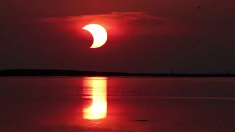 Solar eclipse sunrise, time lapse. Wow, a once in a lifetime event. Stock Footage