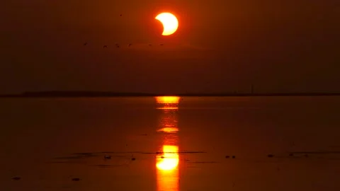 Solar eclipse sunrise! Wow, a once in a lifetime event 動画素材 155454435