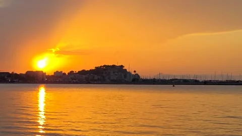 Solar Eclipse Sunset 2026 Time Lapse Over Denia Castle and Marina Sea Stock Footage 342079822