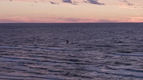 Solar Eclipse Sunset Over Baltic Sea - Kitesurfer Beneath Magical Skies Stock Footage 345474518