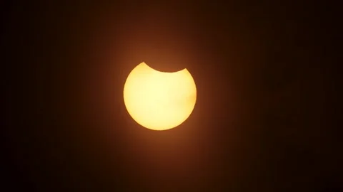 Solar Eclipse taking place looking up at the Sun and Moon Stock Footage 327757243