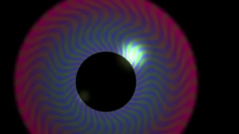 Solar eclipse with vibrant colors and light effects on a dark background. Stock Footage 335540297