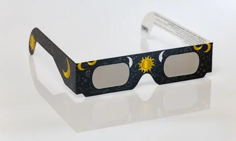 Solar eclipse viewing glasses protecting eyes during event Stock Photos