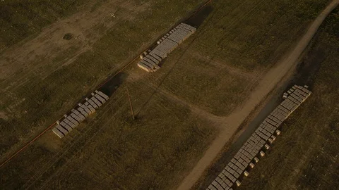 SOLAR ENERGY PANEL FIELD DJI INSPIRE DRONE AERIAL HAY BALES AND IRRAGATION Video stock 111492274