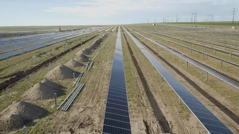 SOLAR ENERGY PANEL FIELD DJI INSPIRE DRONE AERIAL PAN LEFT TO RIGHT CLOSE UP Video stock 111494804
