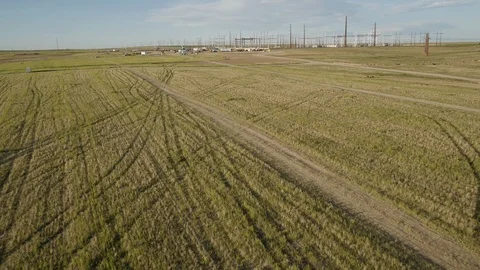 SOLAR ENERGY PANEL FIELD DJI INSPIRE DRONE AERIAL JOB SITE WITH TRAILERS Video stock 111495461