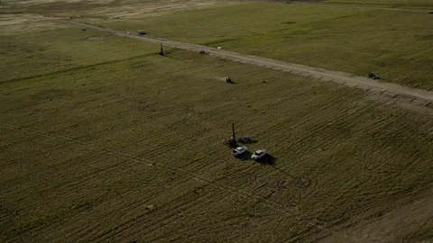 SOLAR ENERGY PANEL FIELD DJI INSPIRE WORKERS IN FIELD Stock-Footage 111621889