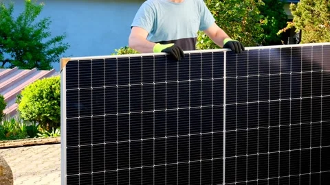 Solar energy.Solar panel in the hands of a worker Stock Footage 196853737
