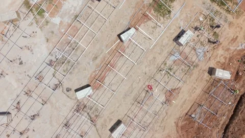 Solar Farm Construction with Empty Panel Stands and Solar Panels in Boxes Stock Footage 344752661