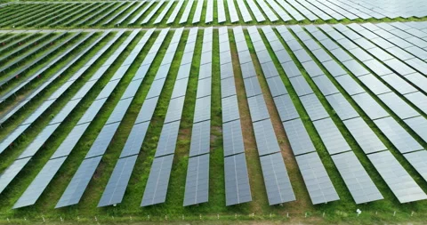 Solar Farm Renewable Energy Array With Photovoltaic Panels In Green Landsca.. Video stock 338331474
