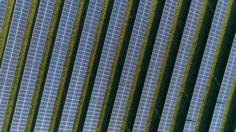 Solar farm top down vertical lift up revealing shot, slowly turning Stock Footage 74403638