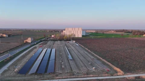 Solar farm under construction beside SS9 Via Emilia in Fiorenzuola d'Arda, Po Stock Footage 342292909