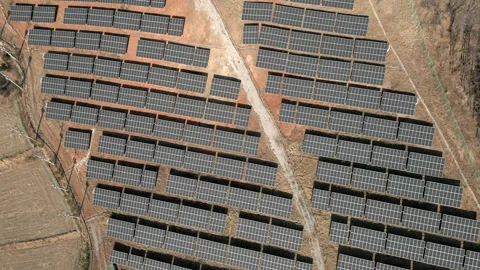 Solar Farm units environment producing renewable energy Aerial View, South Korea Stock Footage 229907841