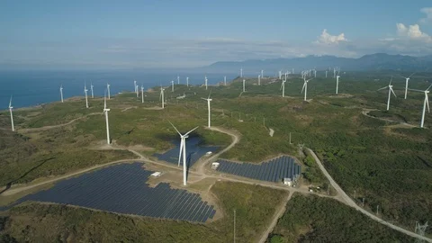 Solar Farm with Windmills. Philippines, Luzon Stock Footage