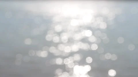 Solar flare played on a small ripple in the river Stock Footage 61654672