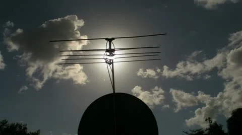 Solar flare rays tv antenna satellite dish Stock Footage 10733405