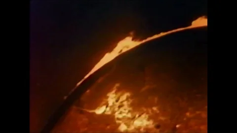 A solar flare is shown on the face of the sun and an animation shows the heating Stock Footage 89874480