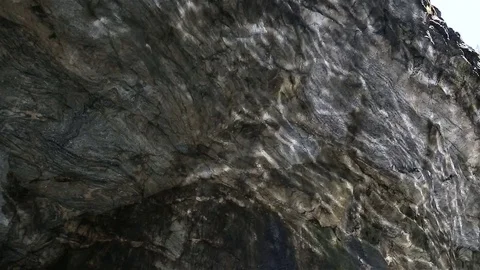 The solar flares on the marble wall in the cave Stock Footage 76582981