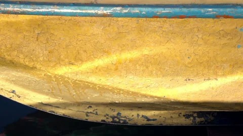 Solar flecks reflection from the water surface on old obsolete boat 库存影片 57972121