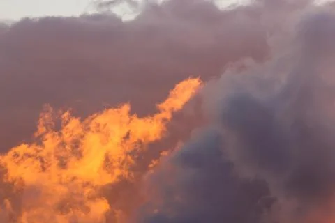 Solar illumination in the clouds. Stock Photos