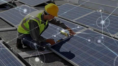 Solar installer kneeling placing level and aligning panel network overlay Stock Footage 331333533
