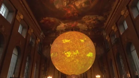 A solar model illuminates the lobby of the Old Royal Naval College in London, Lo Stock Footage 300899125