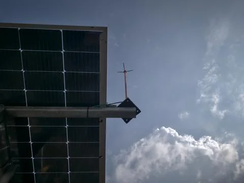 Solar Panel Against Dramatic Cloudy Blue Sky, Renewable Energy Power Generation. Stock Photos