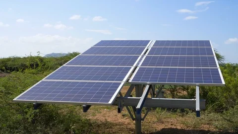 Solar panel among green fields in sunlight 動画素材 111303852