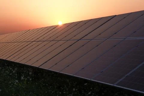 Solar panel and sunset. Stock Photos