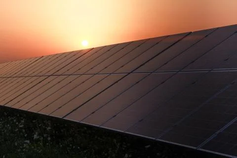 Solar panel and sunset. Stock Photos