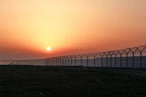 Solar panel and sunset. Stock Photos