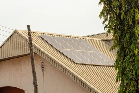 Solar panel array and electricity power line Stock Photos