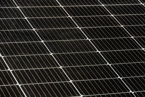 Solar panel array, dark-colored rectangular panels black or blue, photovoltai Foto stock