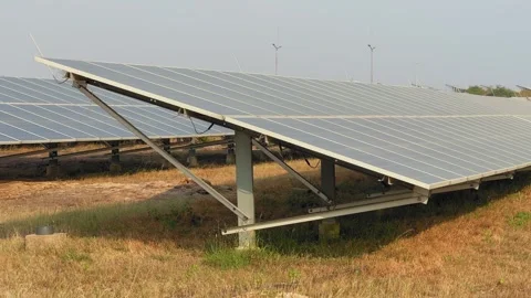 Solar Panel Array Over Swaying Grass Stock Footage 323426422