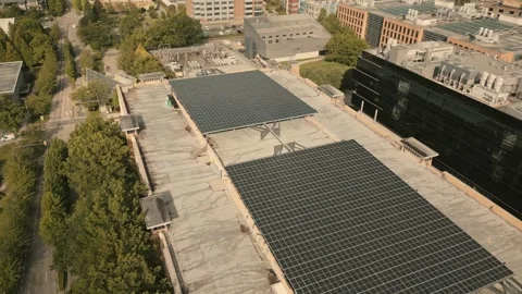 Solar panel array powering green hydrogen facility captured by high angle drone Stock-Footage 333940199