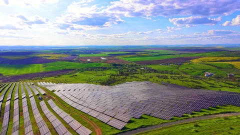 Solar panel array on rolling green hills, Bulgaria. Stock Footage 337204903