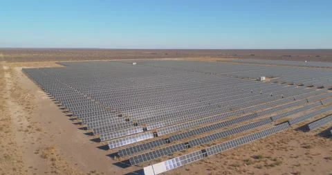 Solar Panel array solar farm texas fly drone over top Video stock 329954095